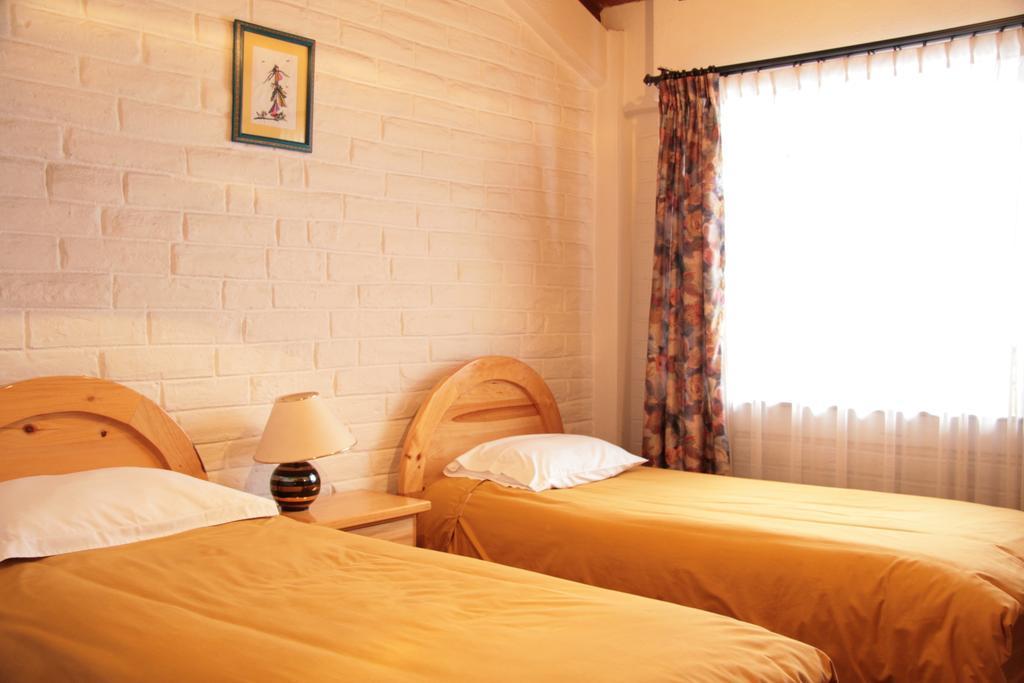 Apartamentos Los Quipus Quito Chambre photo